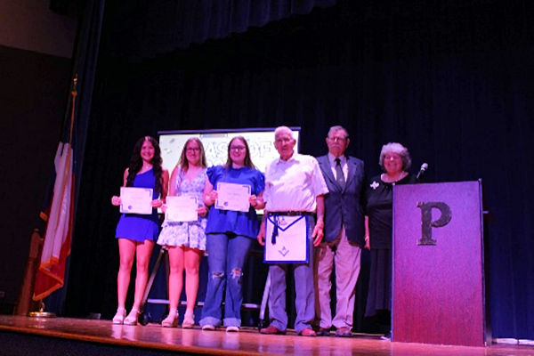 Avery Perry, Caleigh Wilson and Clair Wilson, scholarship recipients,
Jerome Elder, Kenneth Forman, WP and Judy Harris, WM